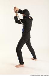 Man Young Athletic Fighting with sword Standing poses Casual Asian
